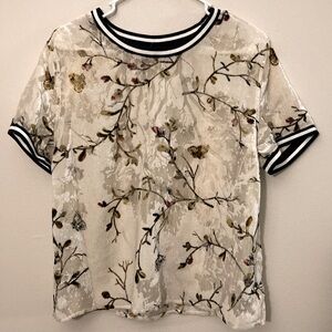a new day white, sheer, velvety top with floral, butterfly pattern. Size L.